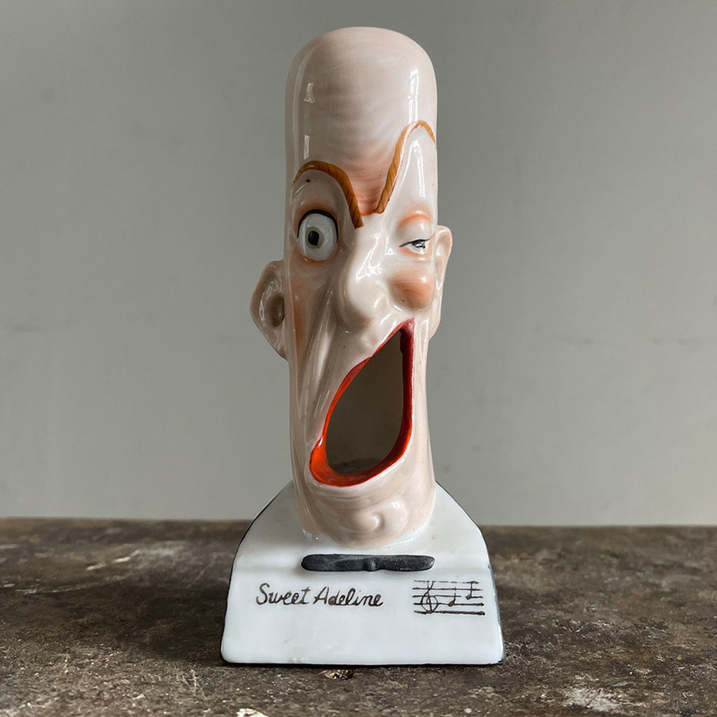 A rare German Porcelain Smoking Ashtray by Schafer &amp; Vater. These unusual objects were used as ashtrays with the smoke of the cigarette escaping through the ear holes. This one sees an old ugly chap with a big old eye and a title that reads 'Sweet Adeline' - SHOP NOW - www.intovintage.co.uk