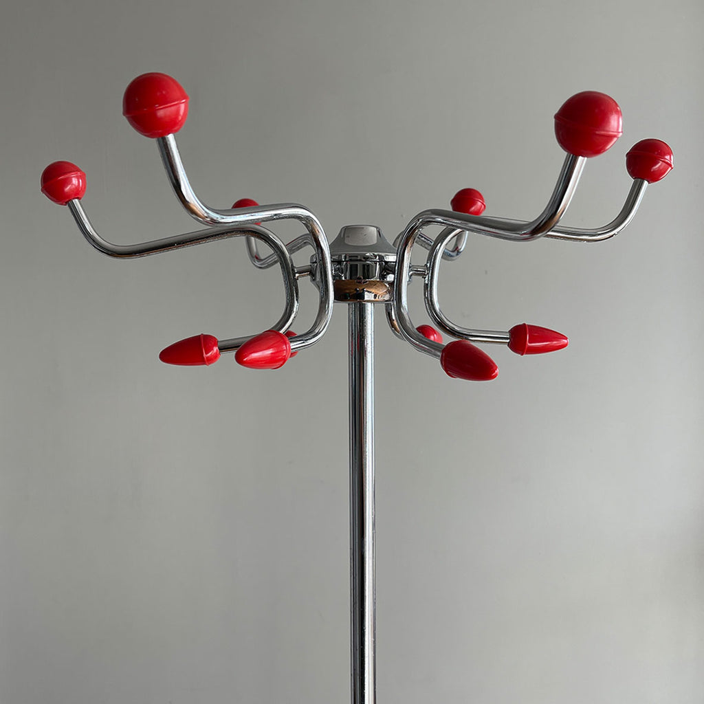 A cool looking Vintage HAGO 'Sputnik' Coat Rack from the 1960s. In a smart looking black, red and chrome colour combo. It has six main double red bobble hooks on the top section, three mini hooks on the stem, and a hoop ring for your umbrellas - SHOP NOW - www.intovintage.co.uk