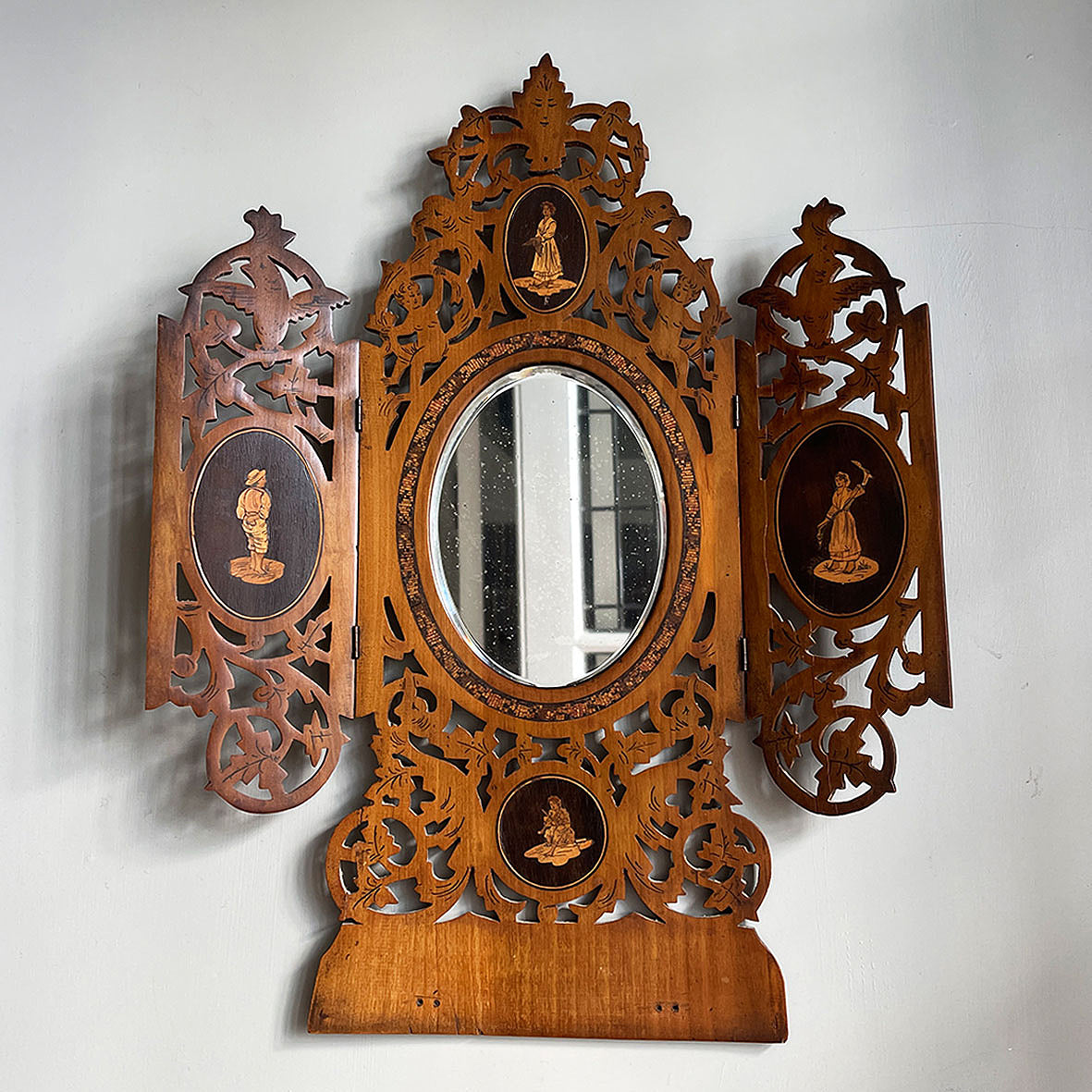 A pretty petit Italian Sorento Ware Olive Wood hinged-door Mirror. A charming mix of fretwork and marquetry showing country peasant scenes. Original mirror plate with slight foxing. A lovely piece with great colour. - SHOP NOW - www.intovintage.co.uk