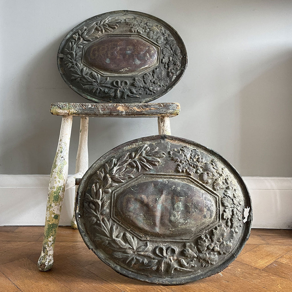 A pair of French pressed bass door plaques that came off of an old lawyer's office. Oak and olive leaves surround a central panel that has some very faded type. Great age and wear to their surfaces - SHOP NOW - www.intovintage.co.uk