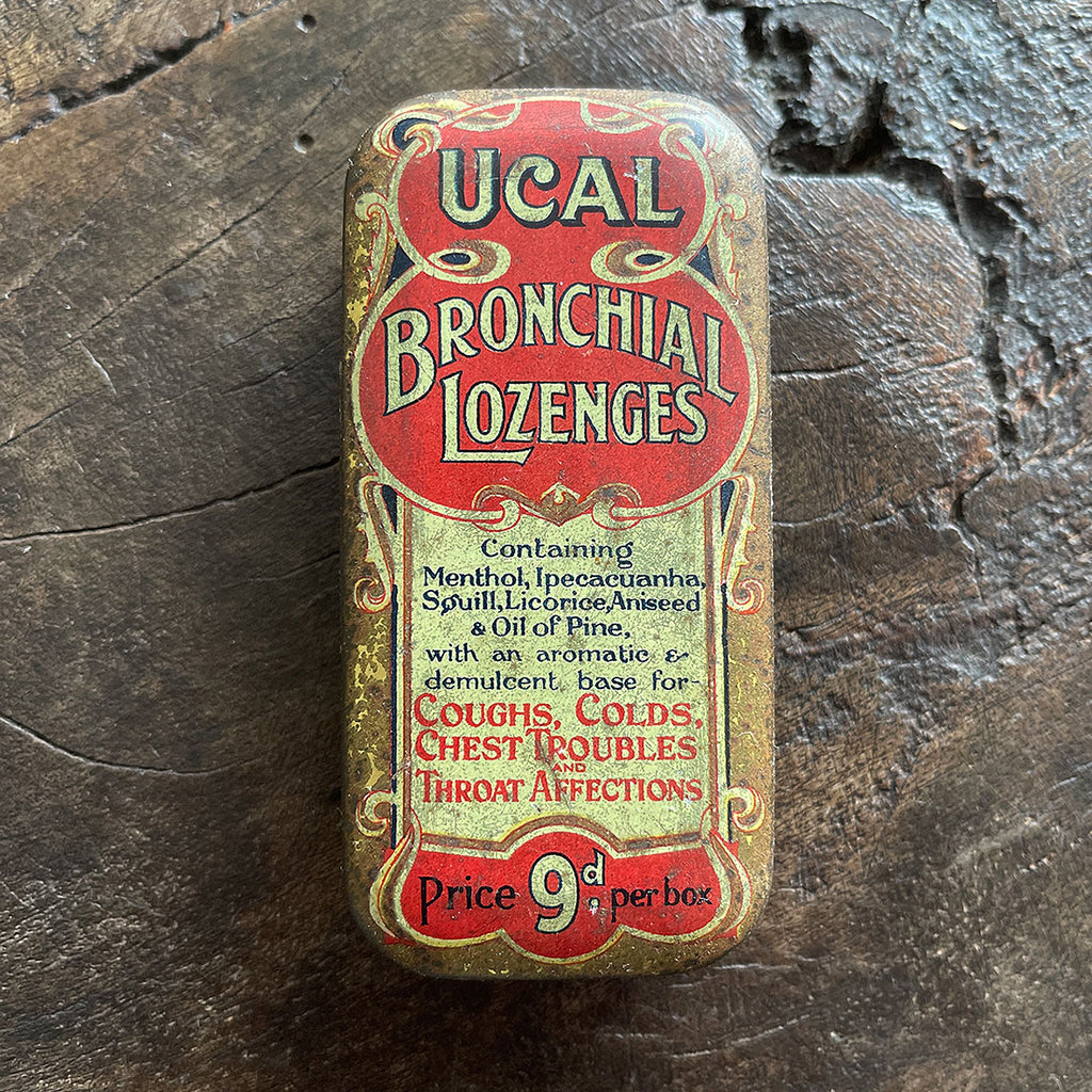 A vintage Ucal Lozenges Tin from the 1920s with a great graphic to the front. Hinged lid. - SHOP NOW - www.intovintage.co.uk