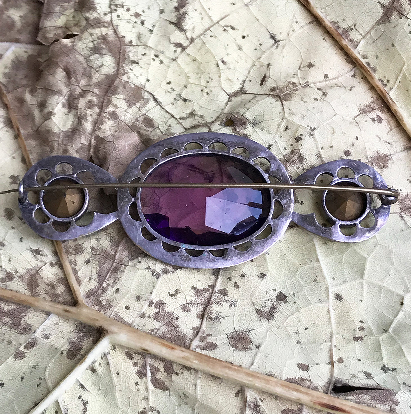 Beautiful quality Victorian brooch with a pale purple cut glass centre gem that is surrounded by a fabulous cut glass diamond studded border with two larger cut glass diamonds at each end - SHOP NOW - www.intovintage.co.uk