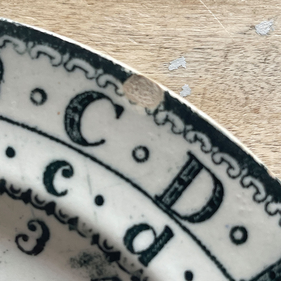 An early Victorian Education Plate by B & K Ltd. This charming little plate was designed to be used as a school teaching implement in English, Spelling and Mathematics, while at the same time being used as a domestic eating plate. Marked on the reverse with the 'B & K LTD' mark - SHOP NOW - www.intovintage.co.uk