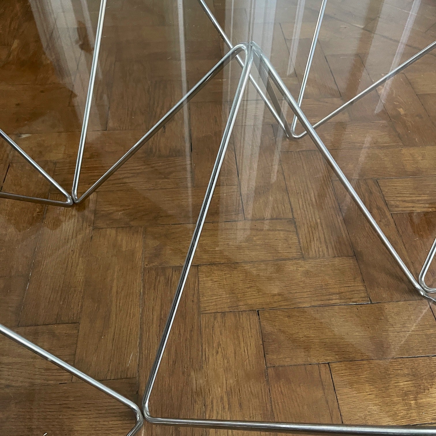 A stylish modernistic chromed square vintage coffee table in the Style of Paolo Piva circa 1980, Italy.Simple and elegant in form, the frame is made of chromed steel shaped connected triangles. Clear glass top - SHOP NOW - www.intovintage.co.uk