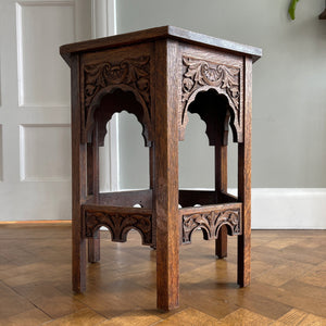 A good looking Carved Oak Side Table. The hexagonal top sees a beautiful hand-carved decorative leaf border with further carving to each of the six side panels. 