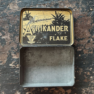 A fresh looking vintage Afrikander Ready Rubbed Flake Tin from the 1930s with a great colours and graphics to the front and inside hinged lid - SHOP NOW - www.intovintage.co.uk