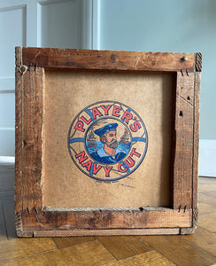 A 1950s Players Airman's Cigarettes Delivery Crate in excellent condition. With the Player's Airman logo to the main sides panels and the Player's Navy Cut logo on one of the end panels. The opposite end has the original delivery label still stuck to it. Great for general storage or a cool log box for beside the fire - SHOP NOW - www.intovintage.co.uk