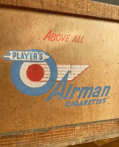 A 1950s Players Airman's Cigarettes Delivery Crate in excellent condition. With the Player's Airman logo to the main sides panels and the Player's Navy Cut logo on one of the end panels. The opposite end has the original delivery label still stuck to it. Great for general storage or a cool log box for beside the fire - SHOP NOW - www.intovintage.co.uk