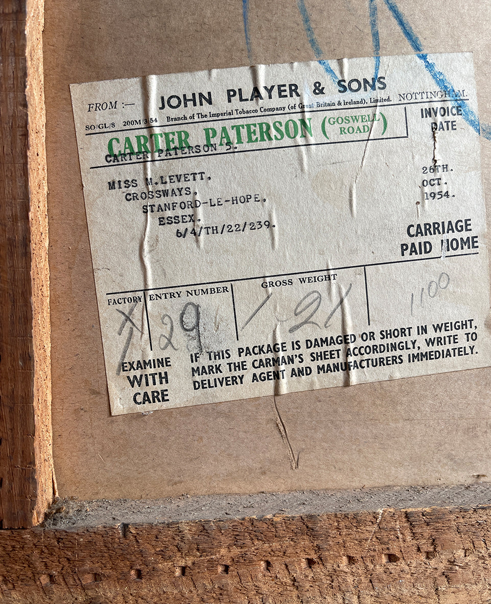 A 1950s Players Airman's Cigarettes Delivery Crate in excellent condition. With the Player's Airman logo to the main sides panels and the Player's Navy Cut logo on one of the end panels. The opposite end has the original delivery label still stuck to it. Great for general storage or a cool log box for beside the fire - SHOP NOW - www.intovintage.co.uk
