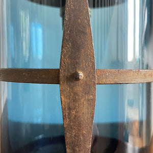 A large Arts & Crafts Hall Lantern. Hand beaten copper top with fleur de lis detailing, smithed iron shade cage Hall lantern with original mouth blown petrol blue glass. Elegant form, scale and colour - SHOP NOW - www.intovintage.co.uk