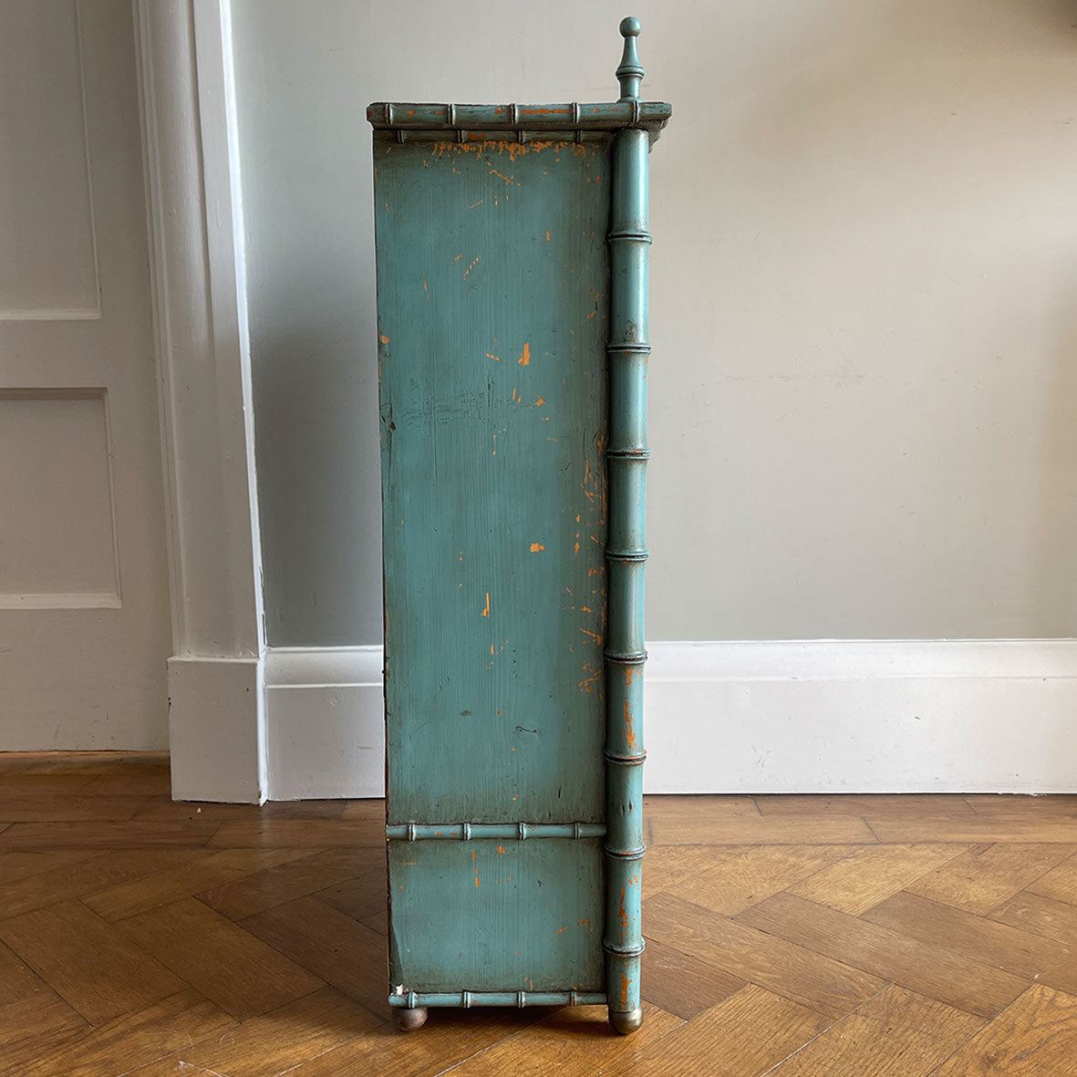 A Pretty Chinese inspired Wall Cabinet in its original paint and with original mirror plate. The cabinet is Chinese inspired, with bamboo edge detailing, golden globe feet and turned finials on top. It is finished in a beautiful and perfectly aged duck egg blue, and the original mirror plate - SHOP NOW - www.intovintage.co.uk