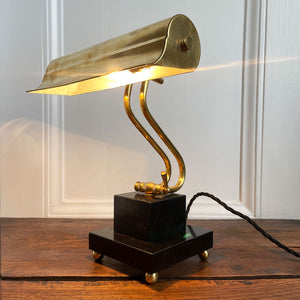 A smart looking Brass and fully adjustable Bankers Lamp with two stepped black marble base and brass bun feet. The lamp has been rewired with new material covered black cord and plug - SHOP NOW - www.intovintage.co.uk