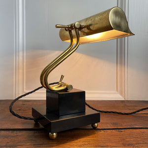 A smart looking Brass and fully adjustable Bankers Lamp with two stepped black marble base and brass bun feet. The lamp has been rewired with new material covered black cord and plug - SHOP NOW - www.intovintage.co.uk