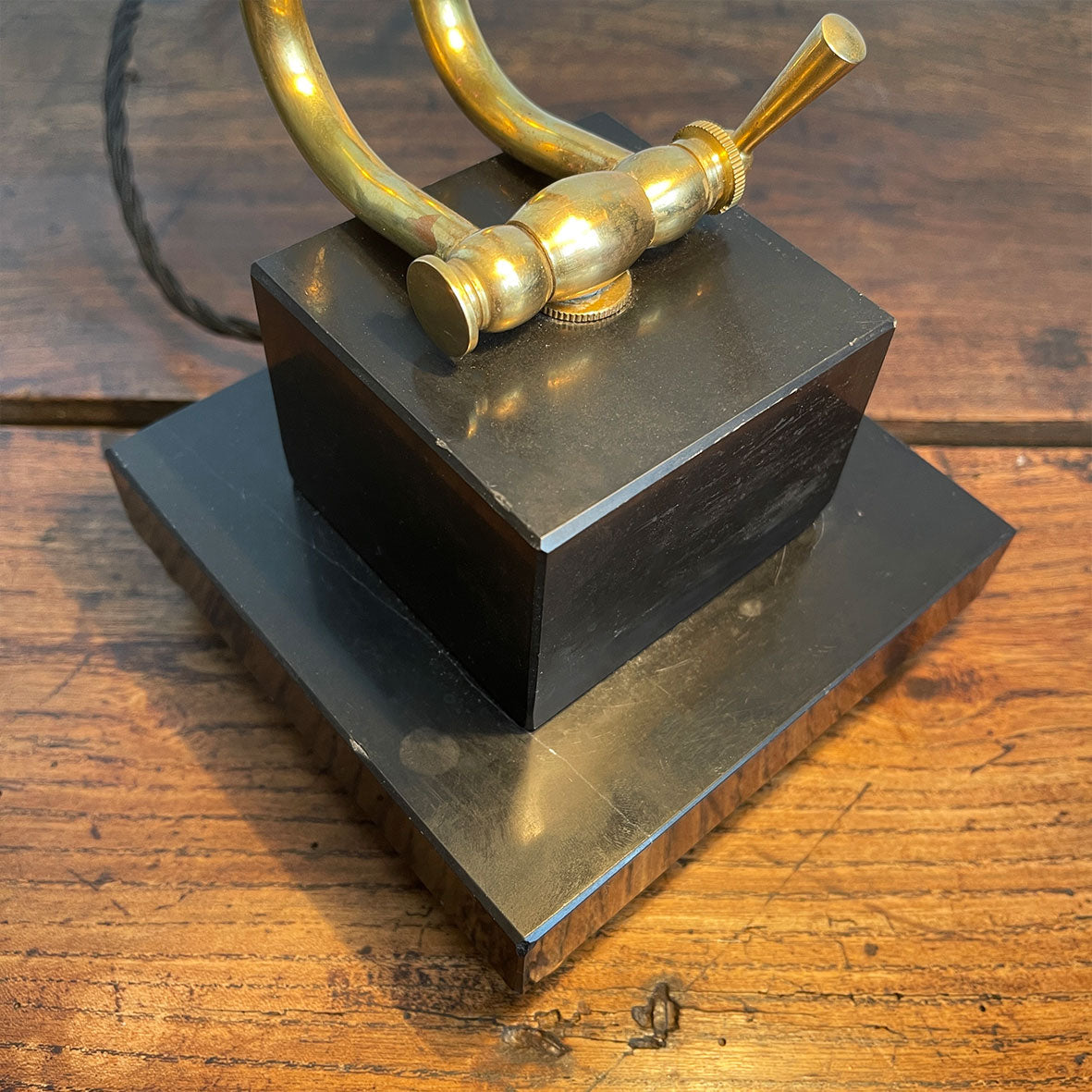 A smart looking Brass and fully adjustable Bankers Lamp with two stepped black marble base and brass bun feet. The lamp has been rewired with new material covered black cord and plug - SHOP NOW - www.intovintage.co.uk