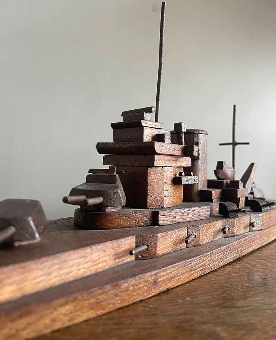 An 1940's vintage oak scratch-built battleship. Superbly built with perfect proportions, masts and fantastic rotating gun turrets. It has a flat bottom, so easy to display - SHOP NOW - Iintovintage.co.uk