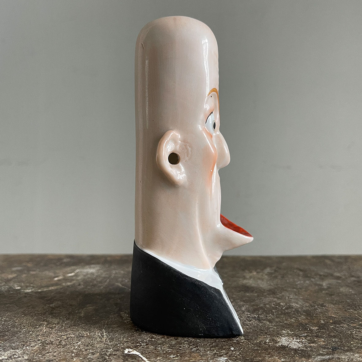 A rare German Porcelain Smoking Ashtray by Schafer &amp; Vater. These unusual objects were used as ashtrays with the smoke of the cigarette escaping through the ear holes. This one sees an old ugly chap with a big old eye and a title that reads 'Sweet Adeline' - SHOP NOW - www.intovintage.co.uk