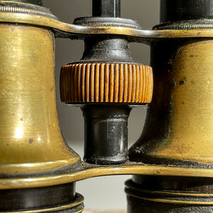 A pair of Victorian Negretti and Zambra binoculars. Made from brass and have a patinated black finish to the brass that has worn away over the years.The mark of NEGRETTI & ZAMBRA -OPTICIANS TO THE QUEEN appears around the rim of one of the eye pieces and 'ADJUSTED IN LONDON' around the other. - SHOP NOW - www.intovintage.co.uk