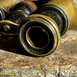 A pair of Victorian Negretti and Zambra binoculars. Made from brass and have a patinated black finish to the brass that has worn away over the years.The mark of NEGRETTI & ZAMBRA -OPTICIANS TO THE QUEEN appears around the rim of one of the eye pieces and 'ADJUSTED IN LONDON' around the other. - SHOP NOW - www.intovintage.co.uk