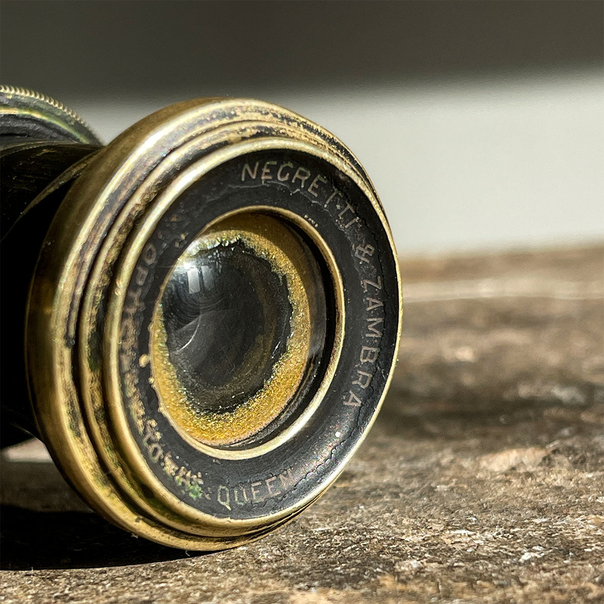 A pair of Victorian Negretti and Zambra binoculars. Made from brass and have a patinated black finish to the brass that has worn away over the years.The mark of NEGRETTI & ZAMBRA -OPTICIANS TO THE QUEEN appears around the rim of one of the eye pieces and 'ADJUSTED IN LONDON' around the other. - SHOP NOW - www.intovintage.co.uk
