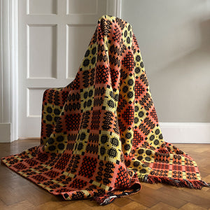 A pure wool Welsh Tapestry blanket in Black, Orange, Red, White and Yellow - SHOP NOW - www.intovintage.co.uk