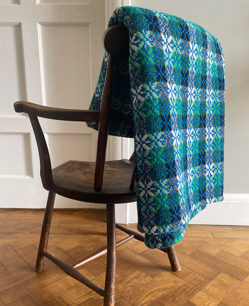 A pure wool Welsh Tapestry blanket in Blue, Aqua Green, white and Black - SHOP NOW - www.intovintage.co.uk