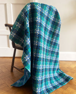 A pure wool Welsh Tapestry blanket in Blue, Aqua Green, white and Black - SHOP NOW - www.intovintage.co.uk