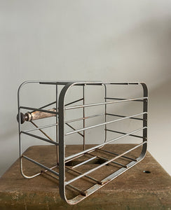 A vintage French bottle holder with wooden handle- perfect for storing all sorts of bottles and even milk if you still have it delivered! Nice decoration to the ends of the handles - SHOP NOW - www.intovintage.co.uk