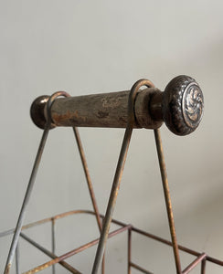 A vintage French bottle holder with wooden handle- perfect for storing all sorts of bottles and even milk if you still have it delivered! Nice decoration to the ends of the handles - SHOP NOW - www.intovintage.co.uk