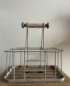 A vintage French bottle holder with wooden handle- perfect for storing all sorts of bottles and even milk if you still have it delivered! Nice decoration to the ends of the handles - SHOP NOW - www.intovintage.co.uk