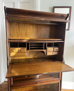 A very versatile 1940s collapsible oak bookcase & secretaire. It comes in 3 collapsible bookcase sections with up & over glass doors and a secretaire section which can be positioned at different levels. The secretaire has a fold down flap that turns into the desk, 6 drawers with brass card markers and plenty of little cubby holes - SHOP NOW - www.intovintage.co.uk