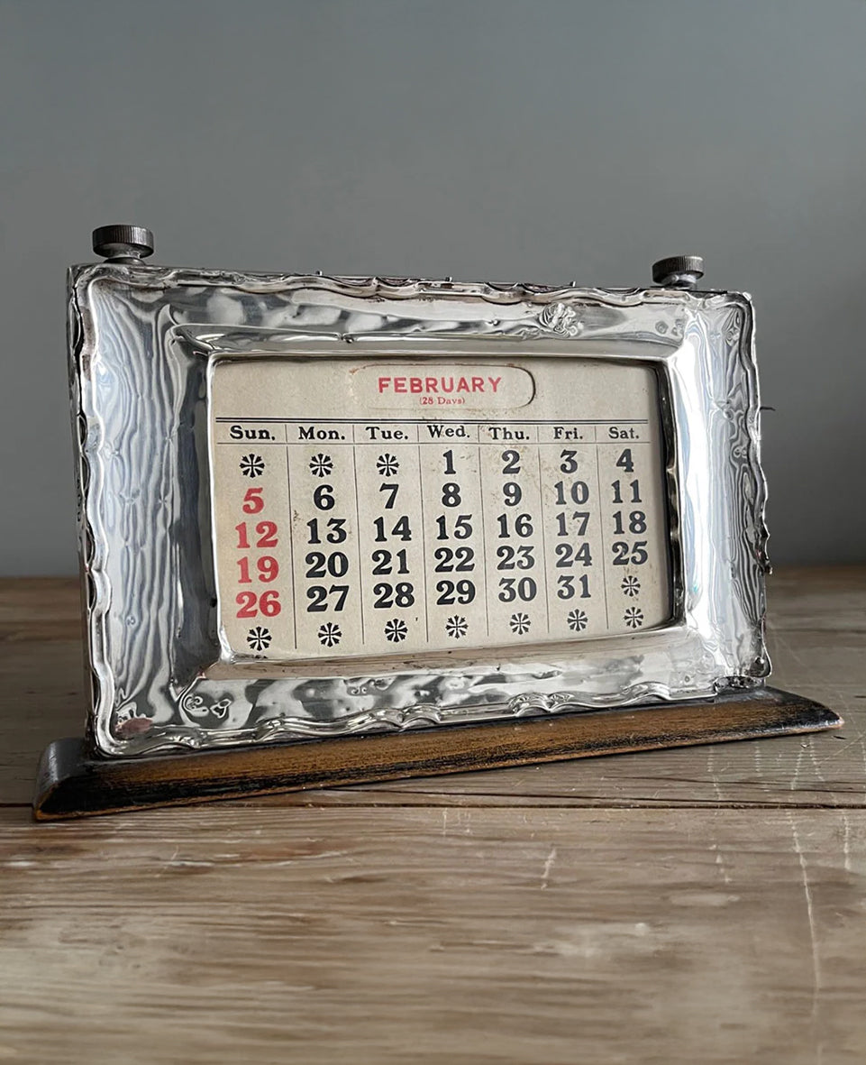 An Antique Silver fronted desk calendar that would look the part on anyone's desk - SHOP NOW - www.intovintage.co.uk