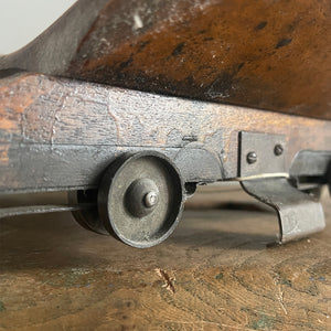 An Original 100 year old Boat Seat with the legend 'CAMBRIDGE 1925' hand painted in gold letters with a black drop shadow to the seat area. The seat section remains still attached to it's under side slide roller mechanism with wheels - SHOP NOW - www.intovintage.co.uk