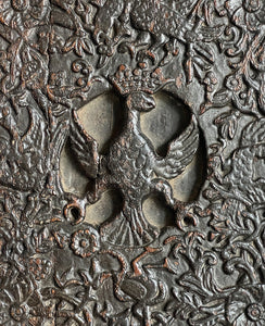 An interesting 17th Century Carved Oak Panel that once would have been the door off of a piece of furniture. The hinge and escutcheon marks are still visible on the reverse. The center sees a crowned eagle surrounded by climbing roses with four larger roses in each corner. Look closer and you'll see other birds and a cupid within the foliage - SHOP NOW - www.intovintage.co.uk
