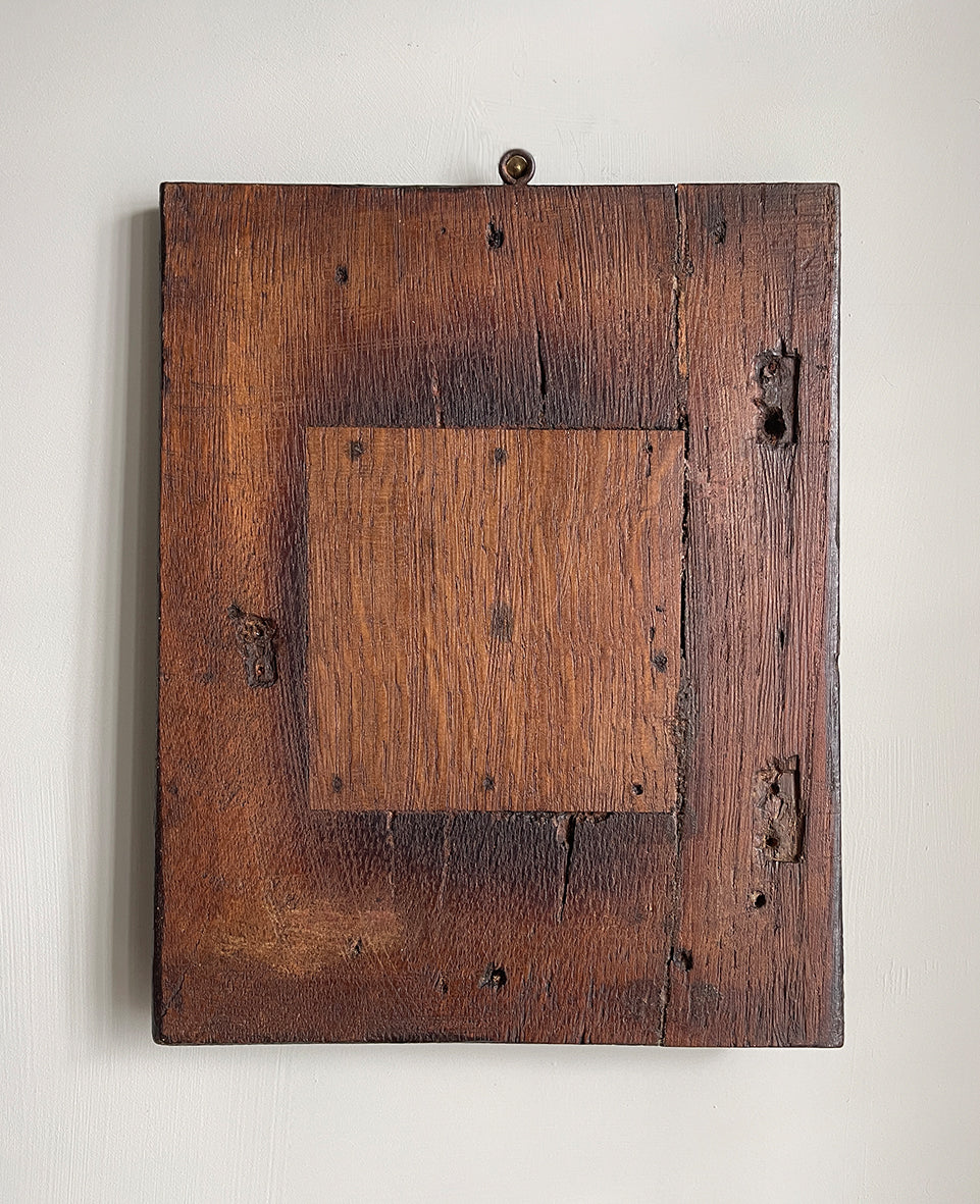 An interesting 17th Century Carved Oak Panel that once would have been the door off of a piece of furniture. The hinge and escutcheon marks are still visible on the reverse. The center sees a crowned eagle surrounded by climbing roses with four larger roses in each corner. Look closer and you'll see other birds and a cupid within the foliage - SHOP NOW - www.intovintage.co.uk