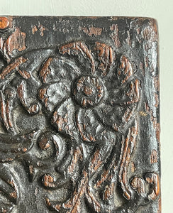 An interesting 17th Century Carved Oak Panel that once would have been the door off of a piece of furniture. The hinge and escutcheon marks are still visible on the reverse. The center sees a crowned eagle surrounded by climbing roses with four larger roses in each corner. Look closer and you'll see other birds and a cupid within the foliage - SHOP NOW - www.intovintage.co.uk