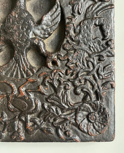 An interesting 17th Century Carved Oak Panel that once would have been the door off of a piece of furniture. The hinge and escutcheon marks are still visible on the reverse. The center sees a crowned eagle surrounded by climbing roses with four larger roses in each corner. Look closer and you'll see other birds and a cupid within the foliage - SHOP NOW - www.intovintage.co.uk