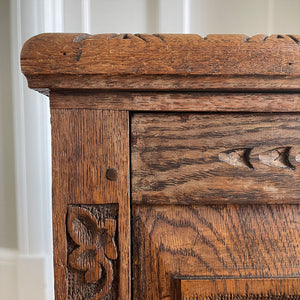 A solid oak chest with fleur de lis and shield carving to the front. Very solid and very heavy! Perfect for a large flat screen TV or for the hallway to keep your boots and shoes in. COMPOSITION: Solid Oak DIMENSIONS: (L) 93.5cm (W) 32cm (H) 59cm - SHOP NOW - www.intovintage.co.uk