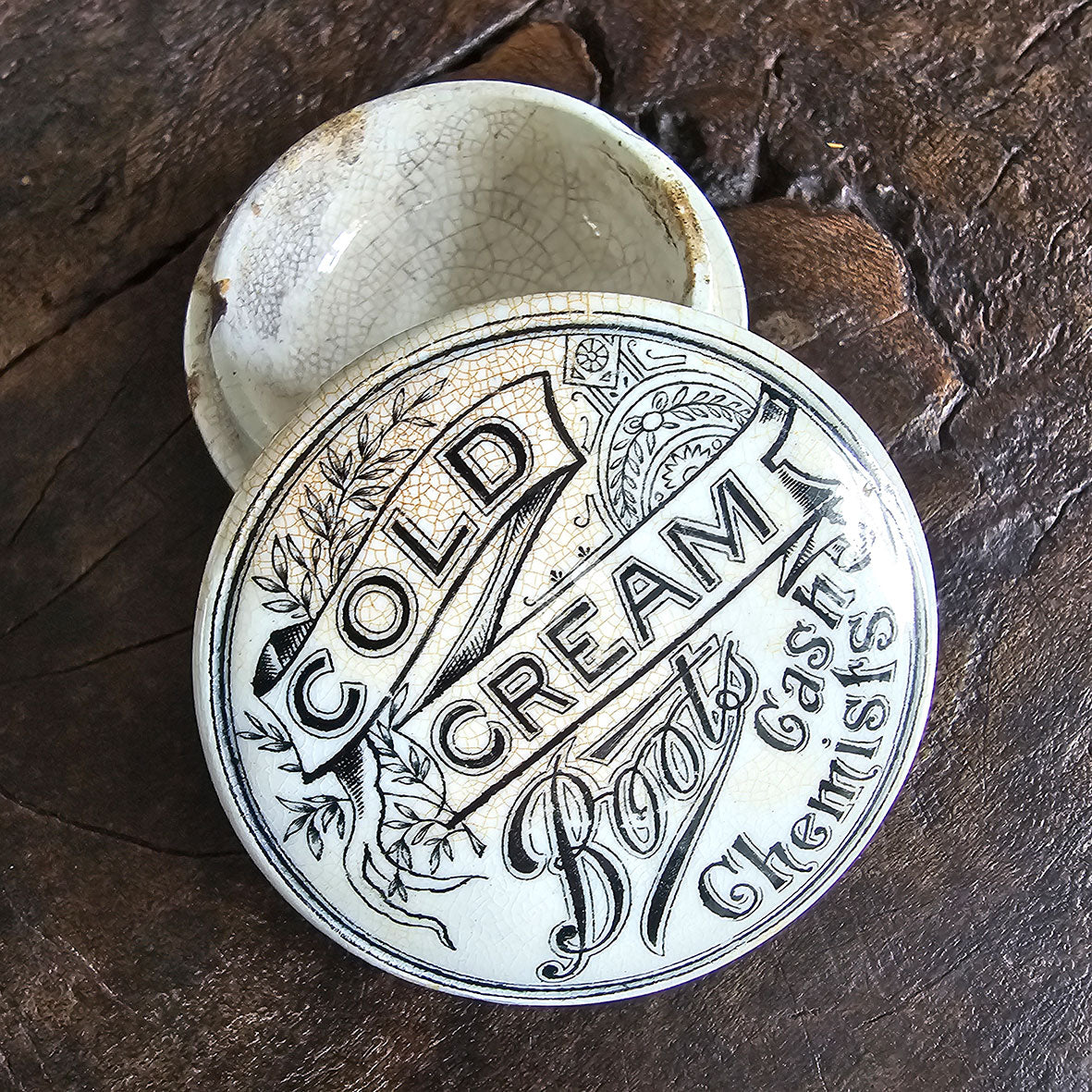 An Edwardian Boots Cold Cream Pot. Lovely crazing to the glazes surface. Marked 'TOO GOOD - PATENT - LONDON'. - SHOP NOW -Intovintage.co.uk