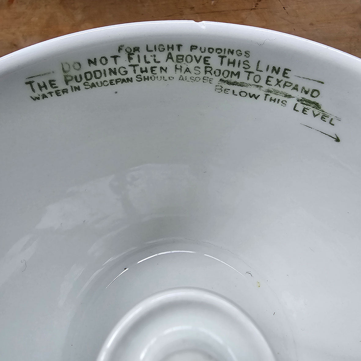 An Antique Grimwade's patented quick cooker pudding bowl with lid, circa 1911, made in England from stoneware pottery. It has a capacity of 2 1/2 pints, 7 inch size with directions printed on bowl and lid, you just need string to tie it up before cooking! SHOP NOW - www.intovintage.co.uk