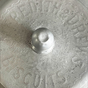 An Edwardian Meredith & Drew Shop Counter Biscuit Jar. Glass body with etched Meredith & Drew Limited logo to the front and an embossed branded lid - SHOP NOW - www.intovintage.co.uk