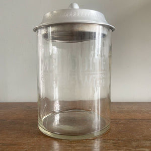 An Edwardian Meredith & Drew Shop Counter Biscuit Jar. Glass body with etched Meredith & Drew Limited logo to the front and an embossed branded lid - SHOP NOW - www.intovintage.co.uk