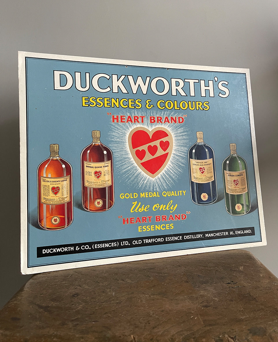 A 1950's Duckworth's essences and colors promotional card store sign. Fantastic bright colours and In a wonderful condition - SHOP NOW - www.intovintage.co.uk