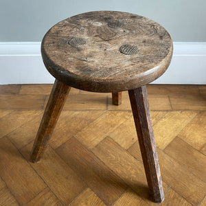 An Antique Elm Oak Milking Stool with a good deep turned Elm seat. Sitting on three octagonal shaped oak legs that can be seen through the seat base. A beautiful piece and very solid - SHOP NOW - www.intovintage.co.uk