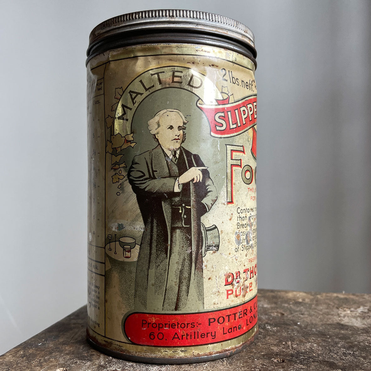 A large 2lb slippery Elm Tin. This tin would have held Malted Slippery Elm Food Powder, that was excellent for breakfast and supper! Nourishing and strengthening too!  Perfect patina with great design and typography. - SHOP NOW - www.intovintage.co.uk