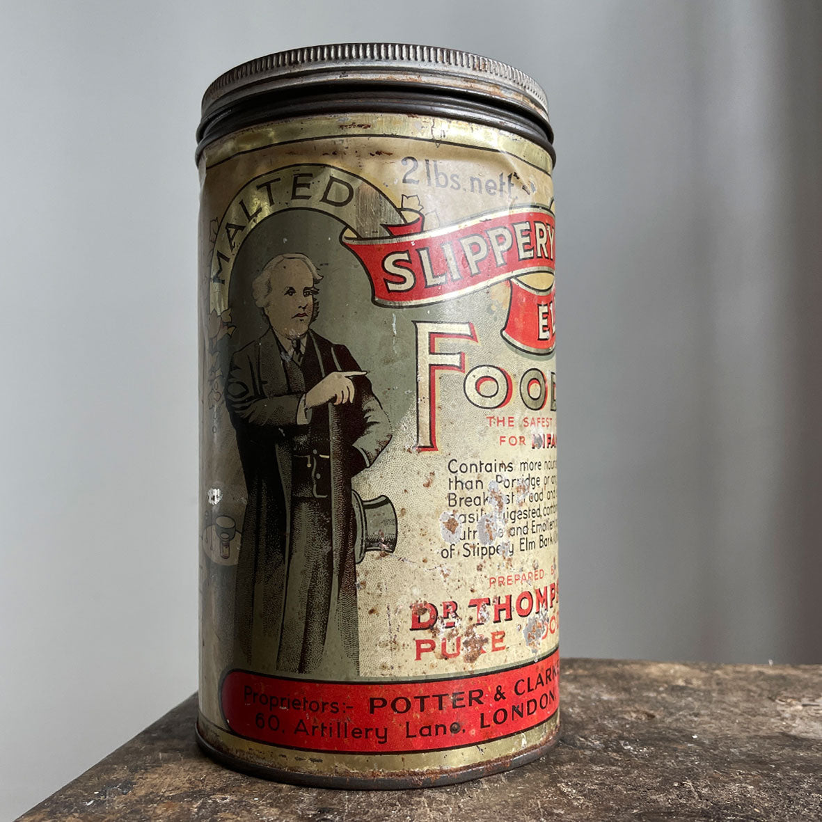 A large 2lb slippery Elm Tin. This tin would have held Malted Slippery Elm Food Powder, that was excellent for breakfast and supper! Nourishing and strengthening too!  Perfect patina with great design and typography. - SHOP NOW - www.intovintage.co.uk