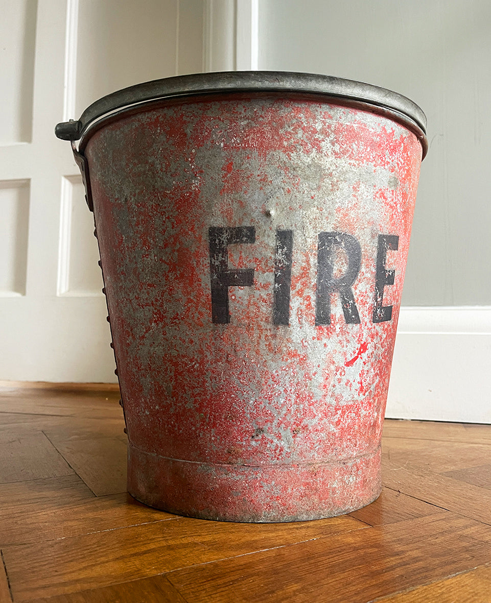 Vintage riveted, galvanised steel fire bucket with a wonderful distressed patina to it's red surface - SHOP NOW - www.intovintage.co.uk
