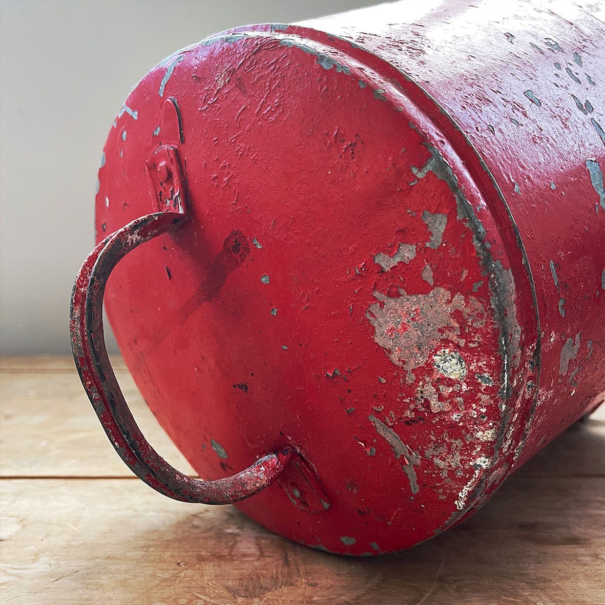 Vintage galvanised steel fire bucket with a wonderful distressed patina to it's red surface - SHOP NOW - www.intovintage.co.uk