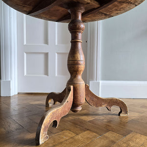 A lovely coloured Rustic French Tilt Top Table. It has a round top raised on three nicely profiled legs and central turned boss. The base still retains its original scumble painted finish. - SHOP NOW - www.intovintage.co.uk