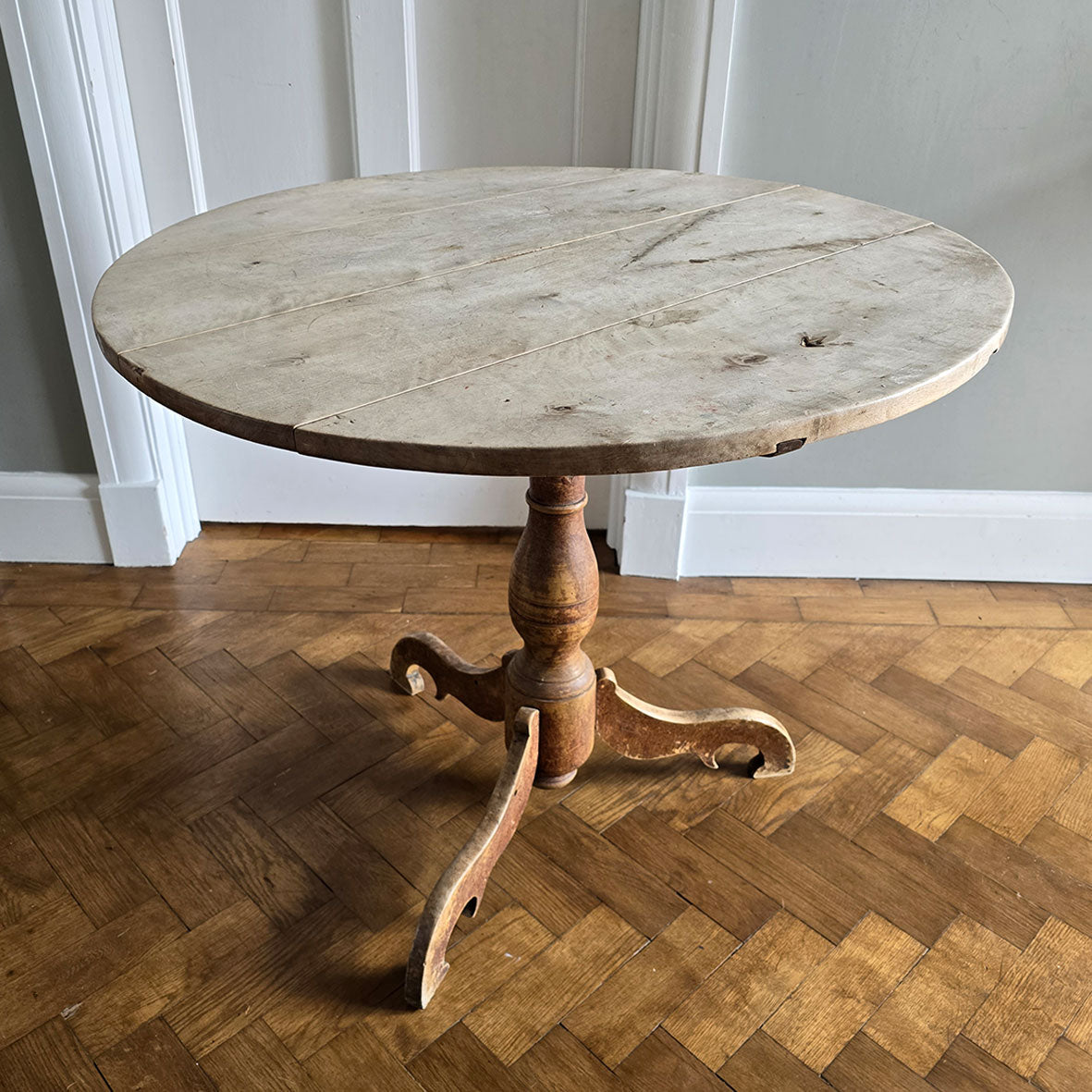 A lovely coloured Rustic French Tilt Top Table. It has a round top raised on three nicely profiled legs and central turned boss. The base still retains its original scumble painted finish. - SHOP NOW - www.intovintage.co.uk