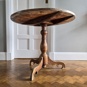 A lovely coloured Rustic French Tilt Top Table. It has a round top raised on three nicely profiled legs and central turned boss. The base still retains its original scumble painted finish. - SHOP NOW - www.intovintage.co.uk